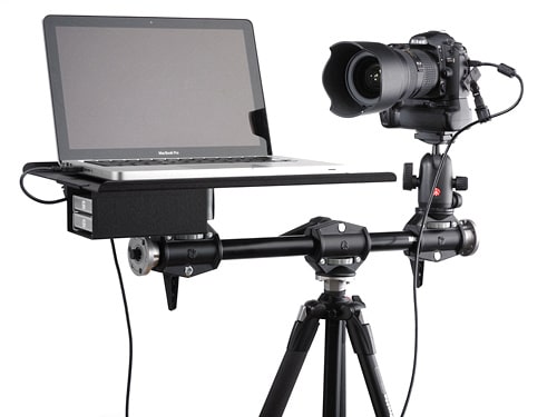 Camera connected to laptop on tripod