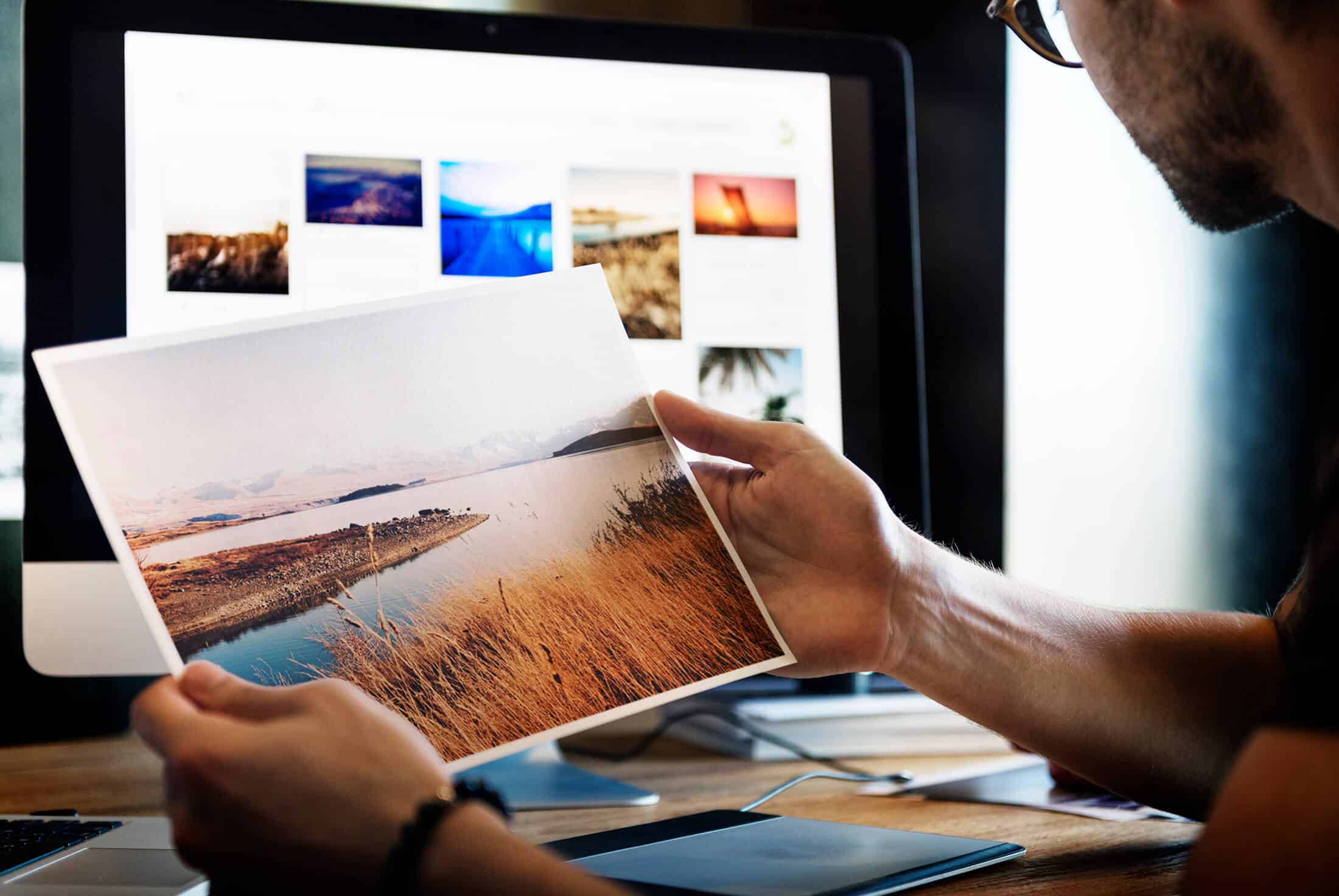 photographer looking at proofs