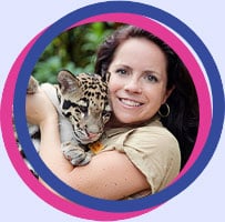 aimee stubbs holding a baby leopard