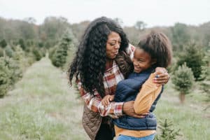 mother and daughter at tree farm