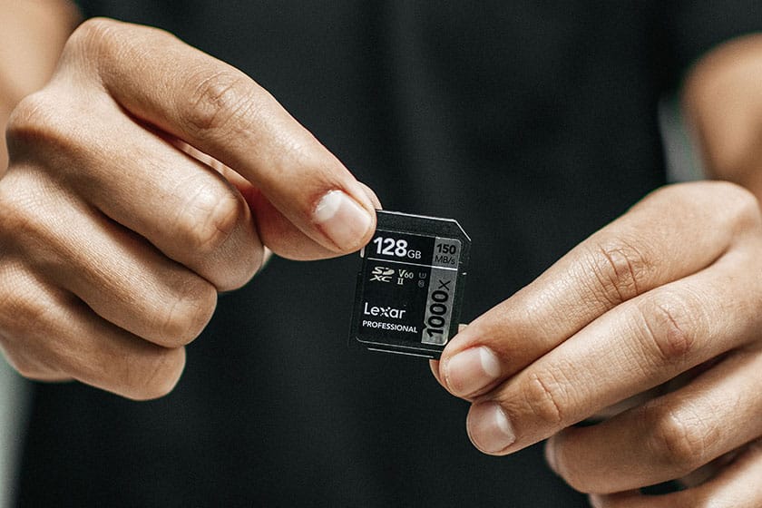 hands holding SD card