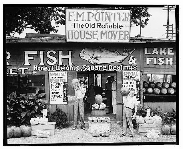 image of a roadside stand selling gourds and fish near Birmingham, Alabama, taken by Walker Evans