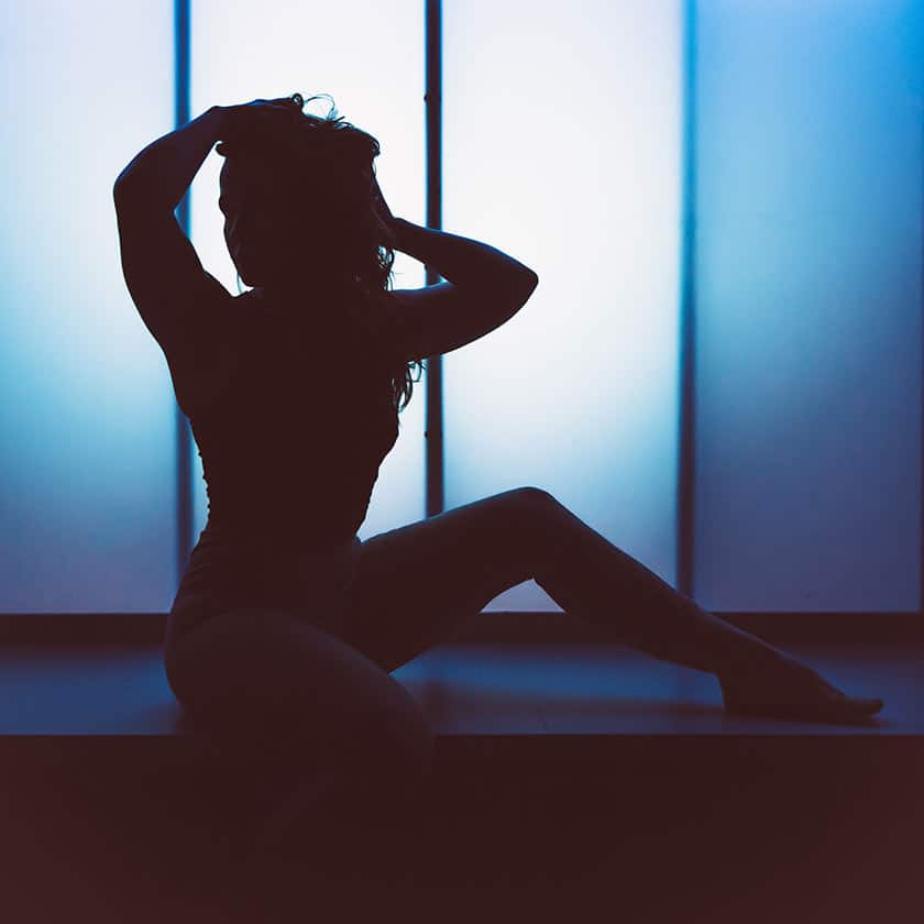 boudoir photograph of a silhouette of a woman
