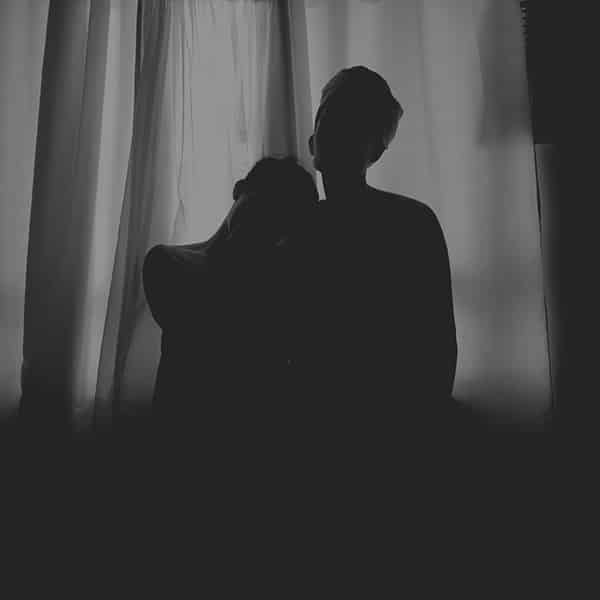 silhouetted black and white couple boudoir photograph 