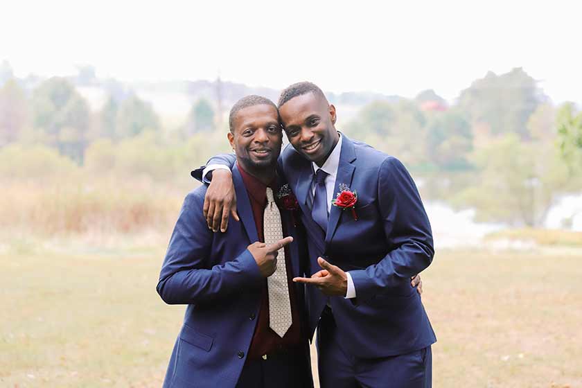 wedding portrait of groom and his brother