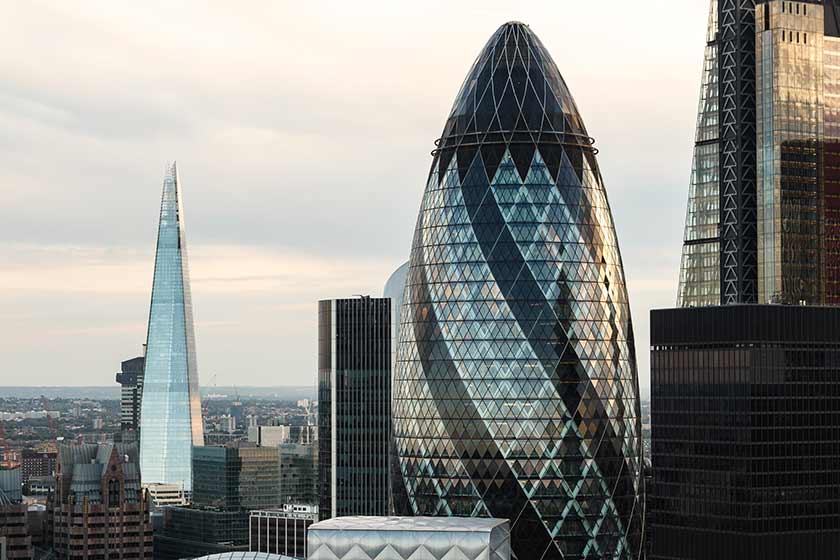 cityscape of glittering, uniquely shaped buildings