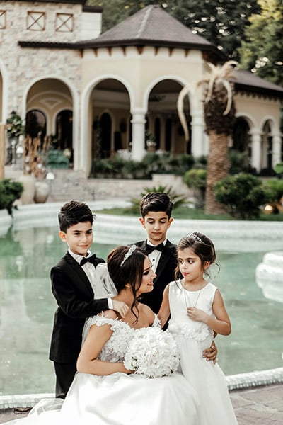 bride posing with her children
