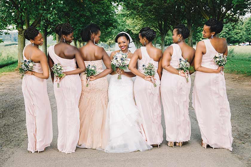 bride posing with her bridal party