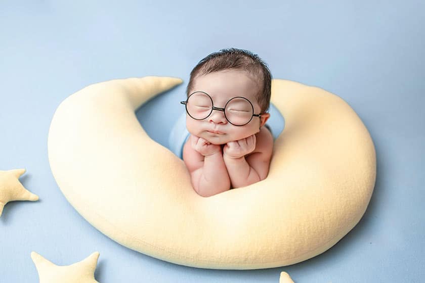 Set of poses Cute baby boy lying on a blanket Stock Photo - Alamy
