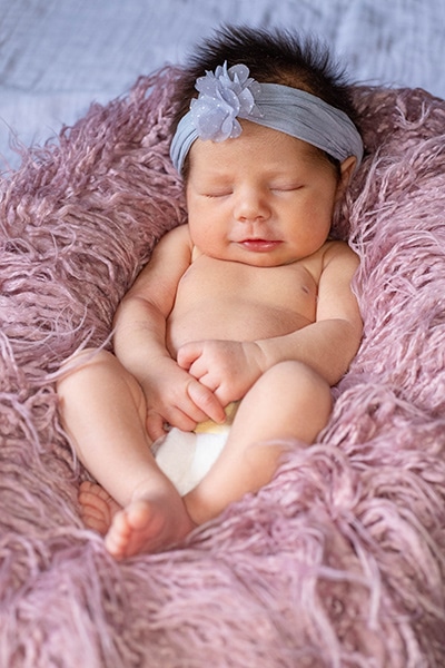beautiful fashionable little baby in pink dress. little princess poses like  a doll Stock Photo - Alamy