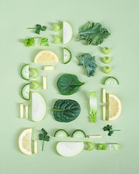 food sliced on flat green surface