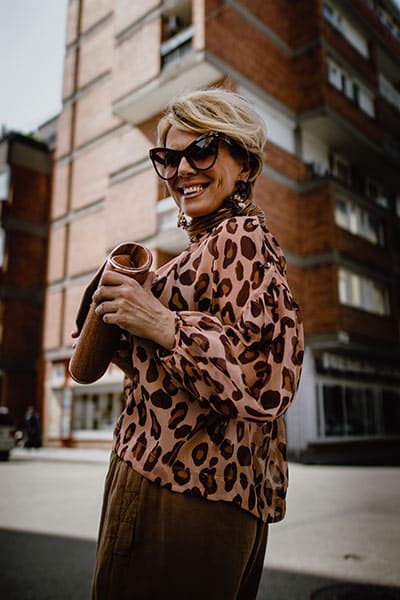 woman in city with sunglasses
