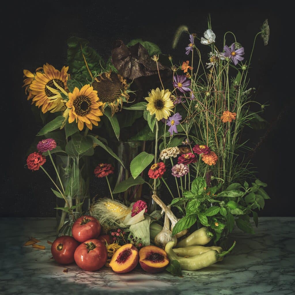 bouquets of late summer flowers with tomatoes peaches and peppers