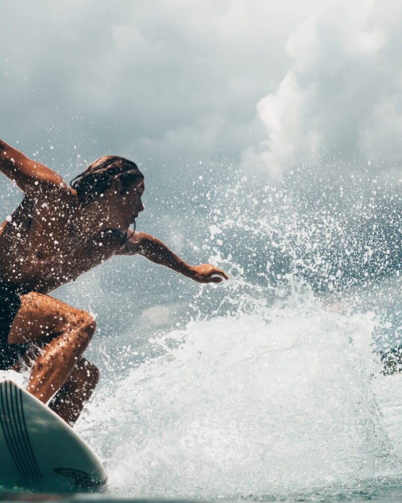 close up of surfer and water spray