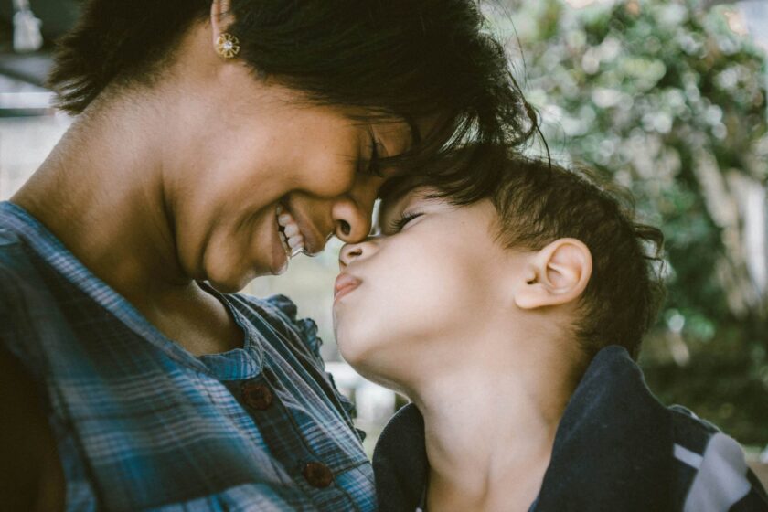 mother and child touching noses