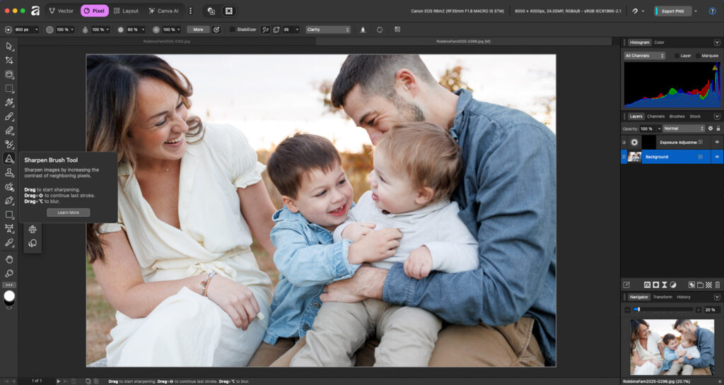 A photo editing software displays an image of a family of five, with a smiling woman in a white dress sitting next to a man in a blue shirt holding two young children who are also smiling. The software interface shows various tools and settings, including the "Sharpen Brush Tool" and layer adjustments.